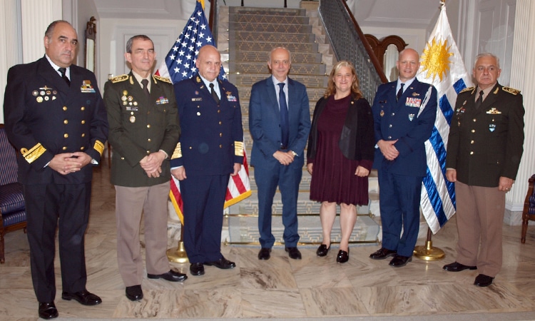 The U.S.’s Charge d’Affaires in Uruguay, Ms. Jennifer Savage, hosting a meeting at the US Chief of Mission's residence. Joined by Uruguayan Minister of Defense, Dr. Javier Garcia, military leaders, and more civilian members that support the military. Photo: US Embassy in Uruguay.