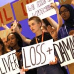 COP 27 demonstrators, Sharm el-Sheikh, Egypt, Nov. 19. Photo: UNclimatechange, Flickr.