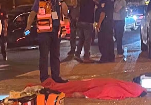The body of a young Palestinian lies on the ground near the city of Ramallah in the occupied West Bank on September 22, 2021. File photo by the Palestine Information Center.