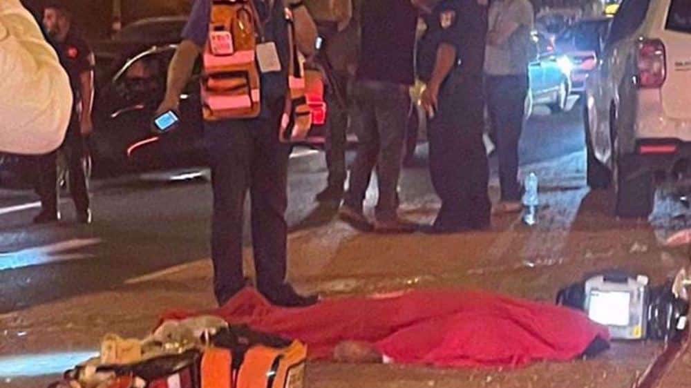The body of a young Palestinian lies on the ground near the city of Ramallah in the occupied West Bank on September 22, 2021. File photo by the Palestine Information Center.