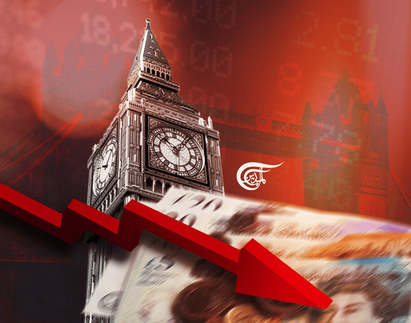 Photo composition with the Big Ben Tower in the center and the London Bridge in the background, with a red pointing down arrow as a reference to UK's poor economic performance. Photo: Al Mayadeen – English.
