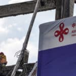 Workers carry out construction work during the demolition of the Salvadoran National Library to build a new one in San Salvador, El Salvador. Photo: Camilo Freedman/Photographer/Getty Images.