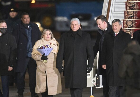 Cuban President Miguel Díaz-Canel and his wife moments after landing in Moscow, Russia. Photo: Ilya Pitalev/Sputnik.