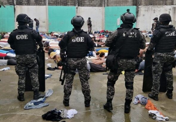 Security forces try to subdue a prison riot in Ecuador. File photo.