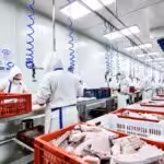 Workers at a meat production facility in Venezuela. File photo.
