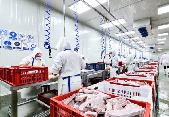 Workers at a meat production facility in Venezuela. File photo.