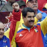 PSUV Vice President Diosdado Cabello (left) and Venezuelan President Nicolás Maduro (right) holding their fists up at a political rally. Photo: AFP/File photo.