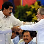 President Maduro and President Lula greet each other during a Sao Paulo forum meeting. Photo: AFP/Elmer Martinez/File photo.