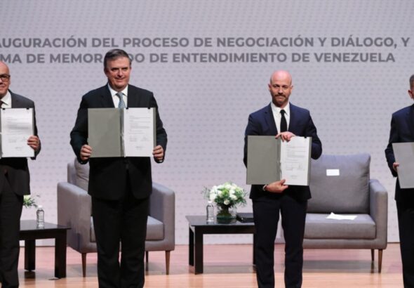 Representatives of the government and the far-right opposition of Venezuela during the launch of the Mexico Talks, August 13, 2021. Photo: Hector Vivas/Gettyimages.ru.