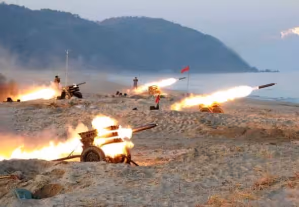 Multiple launch rocket system batteries of the Korean People's Army being tested in December 2016. Photo: KCNA.