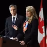 US Secretary of State Antony Blinken listens as Canadian Foreign Minister Melanie Joly speaks during a joint press conference following bilateral talks in Ottawa on Oct 27. Photo: The Canadian Press via AP.