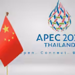 APEC 2022 Thailand Logo with a Chinese flag towards the front and the slogans, "Open. Connect. Balance." Photo: CGTN.