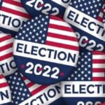 Badge with the flag of the United States and the word Election 2022. File photo.