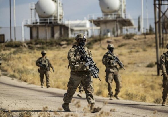 American soldiers patrolling near an oil production. Photo: AFP.