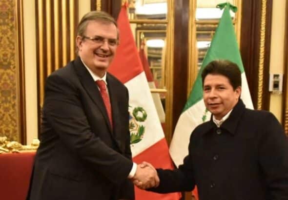 The foreign affairs secretary of Mexico, Marcelo Ebrard (left), shakes hands with the president of Peru, Pedro Castillo, during the former's visit to Peru earlier this year. Photo: file.