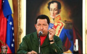 The late president of Venezuela and leader of the Bolivarian Revolution, Hugo Chávez, holds in his hand the Constitution of the Bolivarian Republic of Venezuela. File photo.