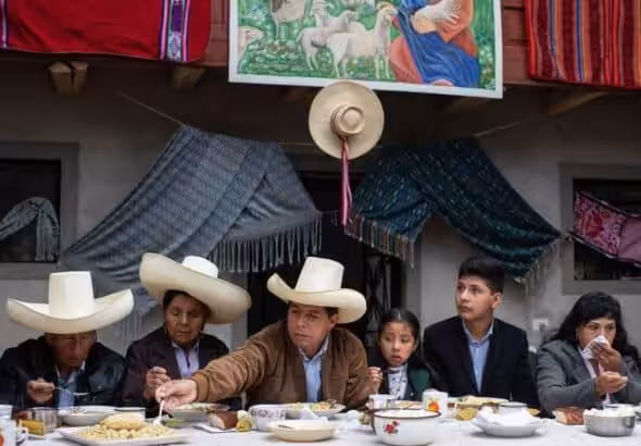Pedro Castillo with his family in Chota, Perú, in June 2021. Photo: Angela Ponce/Getty Images.