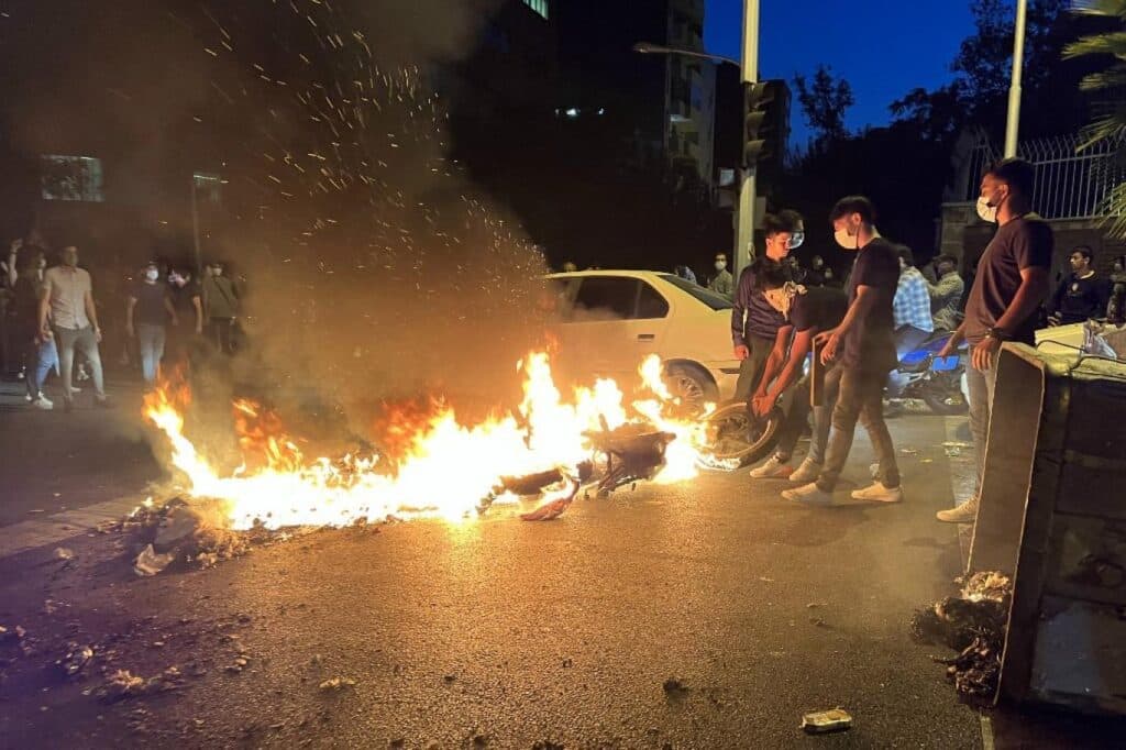 People burn tyres during the recent protests in Iran. File photo.