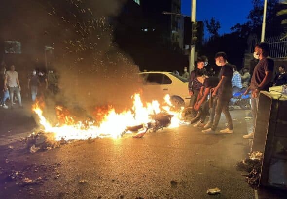People burn tyres during the recent protests in Iran. File photo.