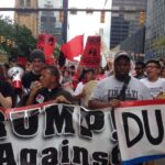 Father José Landaverde leading chants on the march on the Republican National Convention in Cleveland, Ohio. Photo: FightBack News