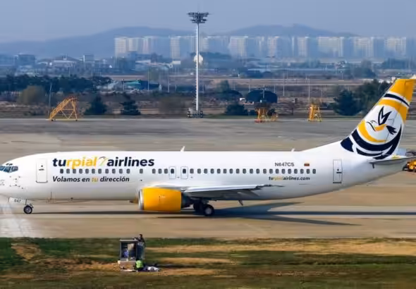 A Turpial Airlines flight at the international airport in Valencia, Venezuela. Photo: Venezuela News.