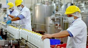 Venezuelan workers at a dairy processing facility. File photo.