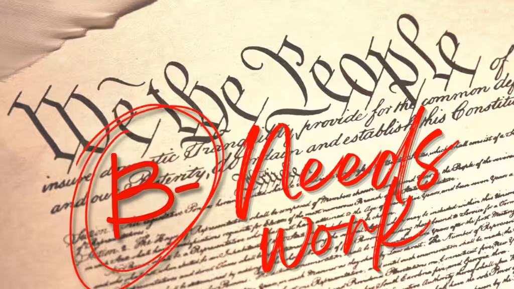 Photo composition showing the US constitution with a “B-, Needs Work” legend overlapped. Photo: Orinoco Tribune.