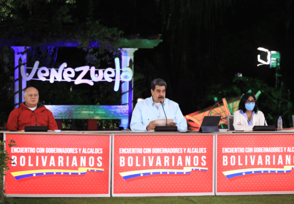 Venezuelan President Nicolas Maduro during a televised address, escorted by Deputy Diosdado Cabello and Vice President Delcy Rodríguez. Photo: Presidential Press.