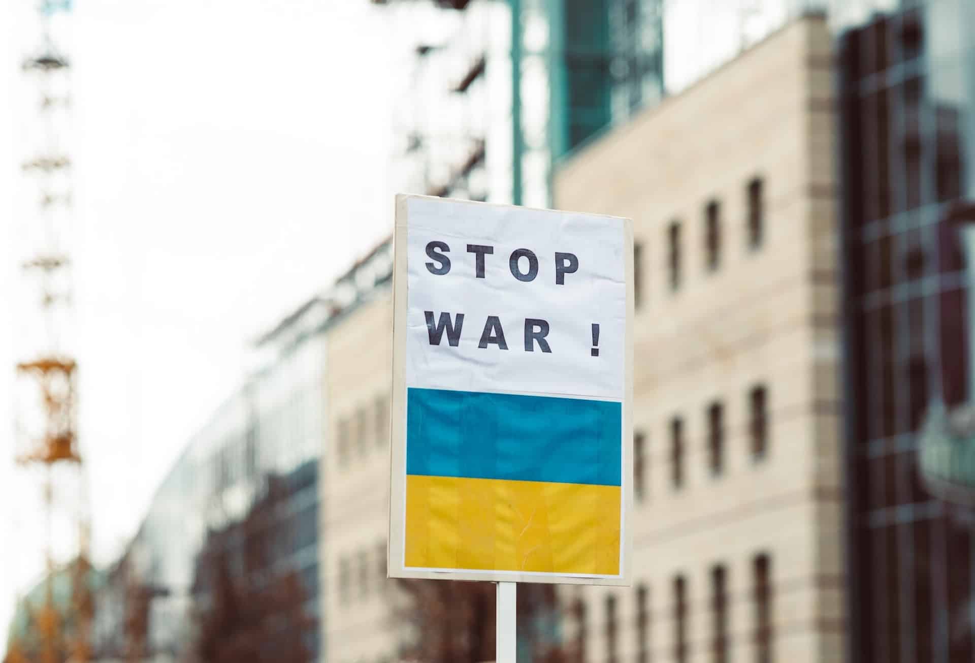 Image of a banner with a "Stop War" caption and the Ukrainian flag below. File photo.