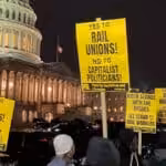 Activists march in front of the US Senate in support of railway workers. Photo: Ben Zinevich.