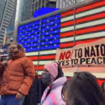A man delivers a speech during a rally at Times Square in New York, the United States, Jan. 14, 2023. Photo: Ziyu Julian Zhu/Xinhua.