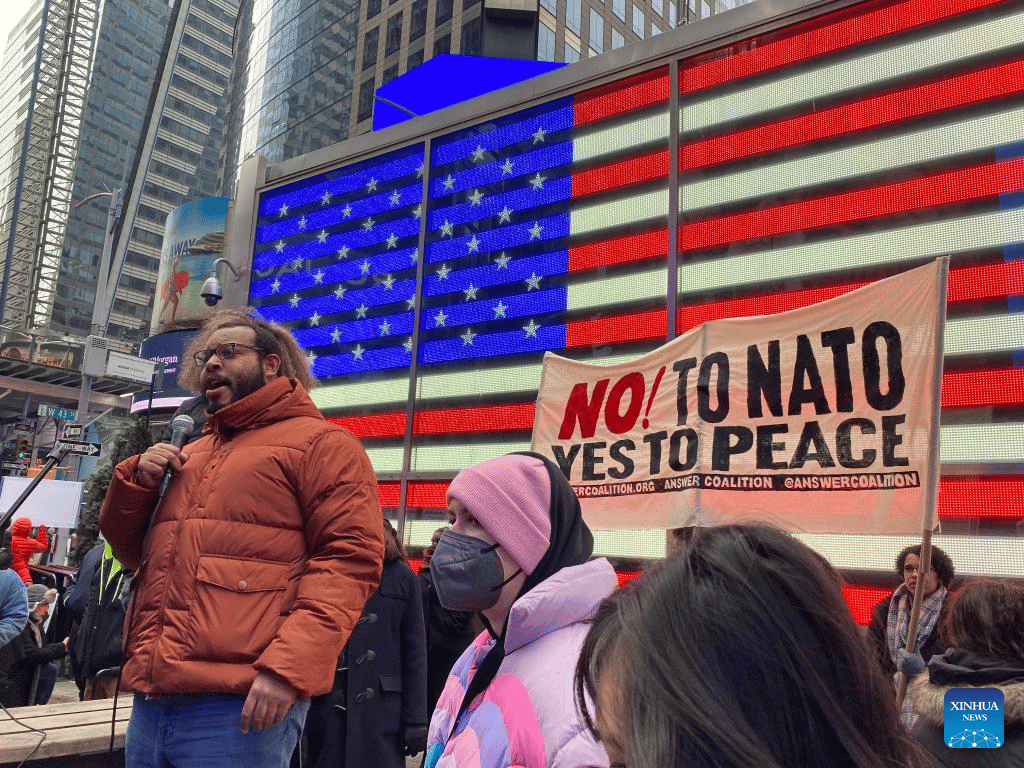 A man delivers a speech during a rally at Times Square in New York, the United States, Jan. 14, 2023. Photo: Ziyu Julian Zhu/Xinhua.