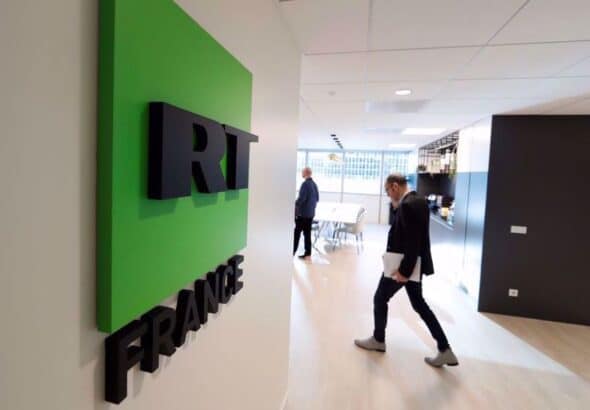 File photo shows the logo of RT France at the studios of the Russian broadcaster during a press visit in Boulogne-Billancourt, near Paris. Photo: Reuters.