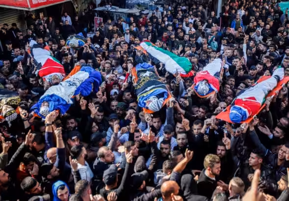 Crowds of mourners gather at funeral for nine Palestinians killed by Israeli military on Thursday, January 26. Photo: Nasser Ishtayeh/Flash90.