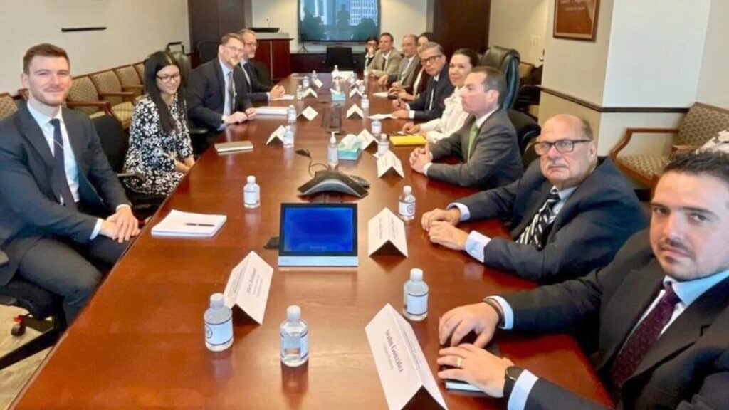 Members of the opposition Unitary Platform meeting with James Story and his team. Photo: @WHAAsstSecty/Twitter.