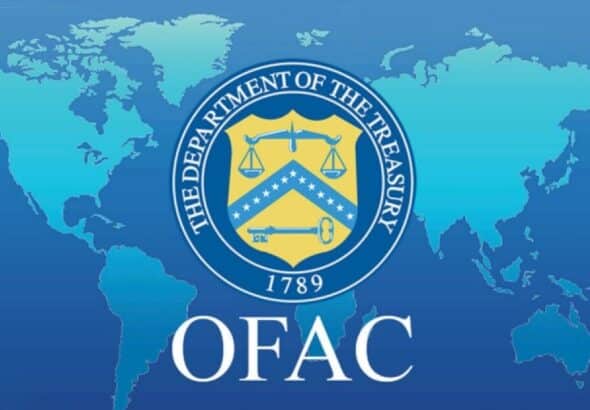 US Treasury Department's OFAC symbol imposed over the world map. File photo.