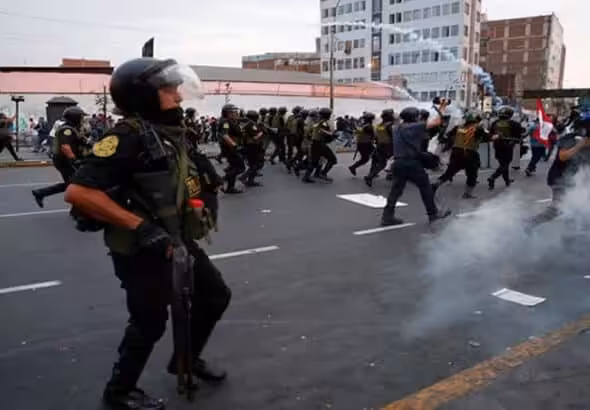 Police launch tear gas at protesters in Lima, Peru. Photo: AFP.