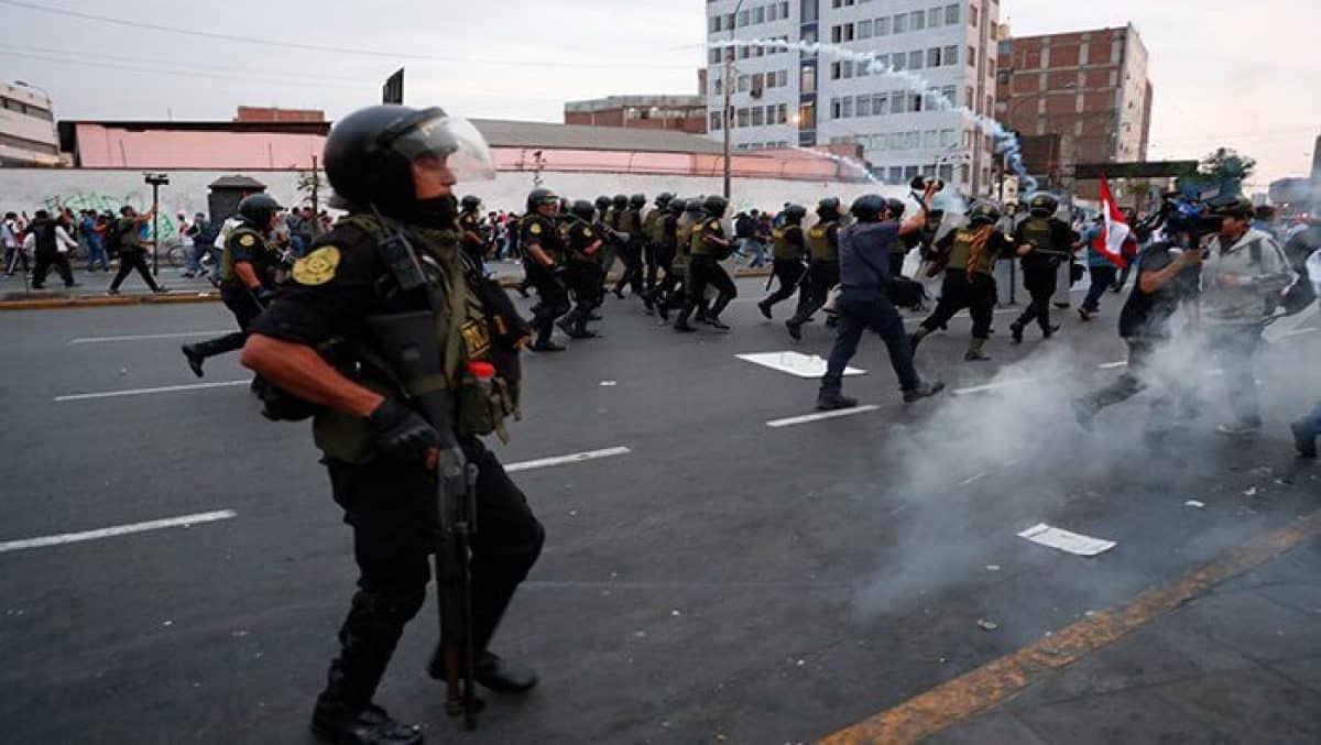 Police launch tear gas at protesters in Lima, Peru. Photo: AFP.