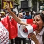 Peruvian protesters demand resignation of de facto President Dina Boluarte and Congress that carried out a coup against the elected President Pedro Castillo. Photo: Su Noticiero.
