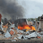 Fire and smoke rise from a house destroyed by US airstrike in Somalia. File photo.