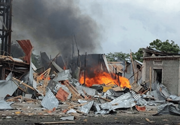Fire and smoke rise from a house destroyed by US airstrike in Somalia. File photo.
