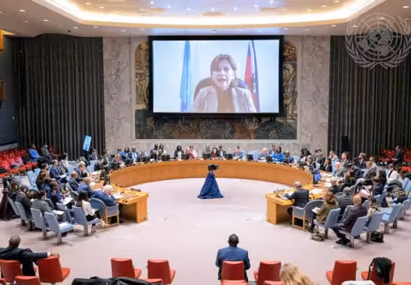 Wide view of the December 21, 2022 Security Council meeting on Haiti with BINUH chief Helen La Lime on the screen. Photo: UN/Eskinder Debebe.