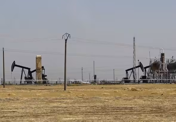 Al-Omar oil field in the eastern countryside of Deir Ezzor. Photo: Hussein Malla/AP.