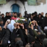 Mourners carry the bodies of two Palestinian resistance fighters who were killed in Jenin, January 14, 2023. Photo: APA Images.