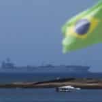The Iranian ship Iris Makran sails off the coast of Rio de Janeiro as a Brazilian flag flies on Copacabana beach, February 27, 2023. Photo: Reuters.