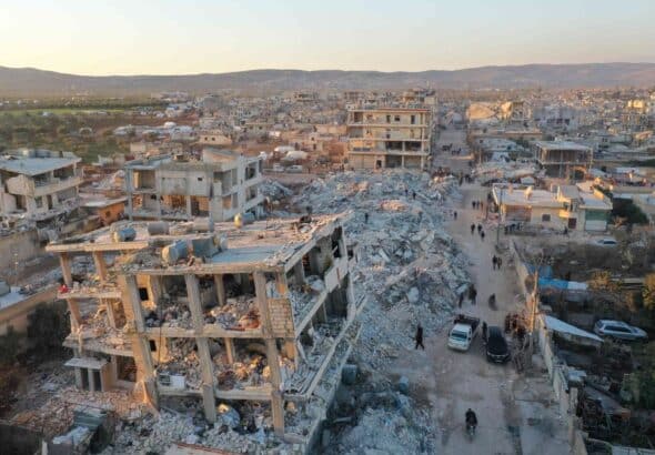 An aerial view shows the destroyed buildings in the rebel-held town of Jindayris on February 9, 2023, three days after a deadly earthquake that hit Turkey and Syria. Photo: Omar HAJ KADOUR /AFP.