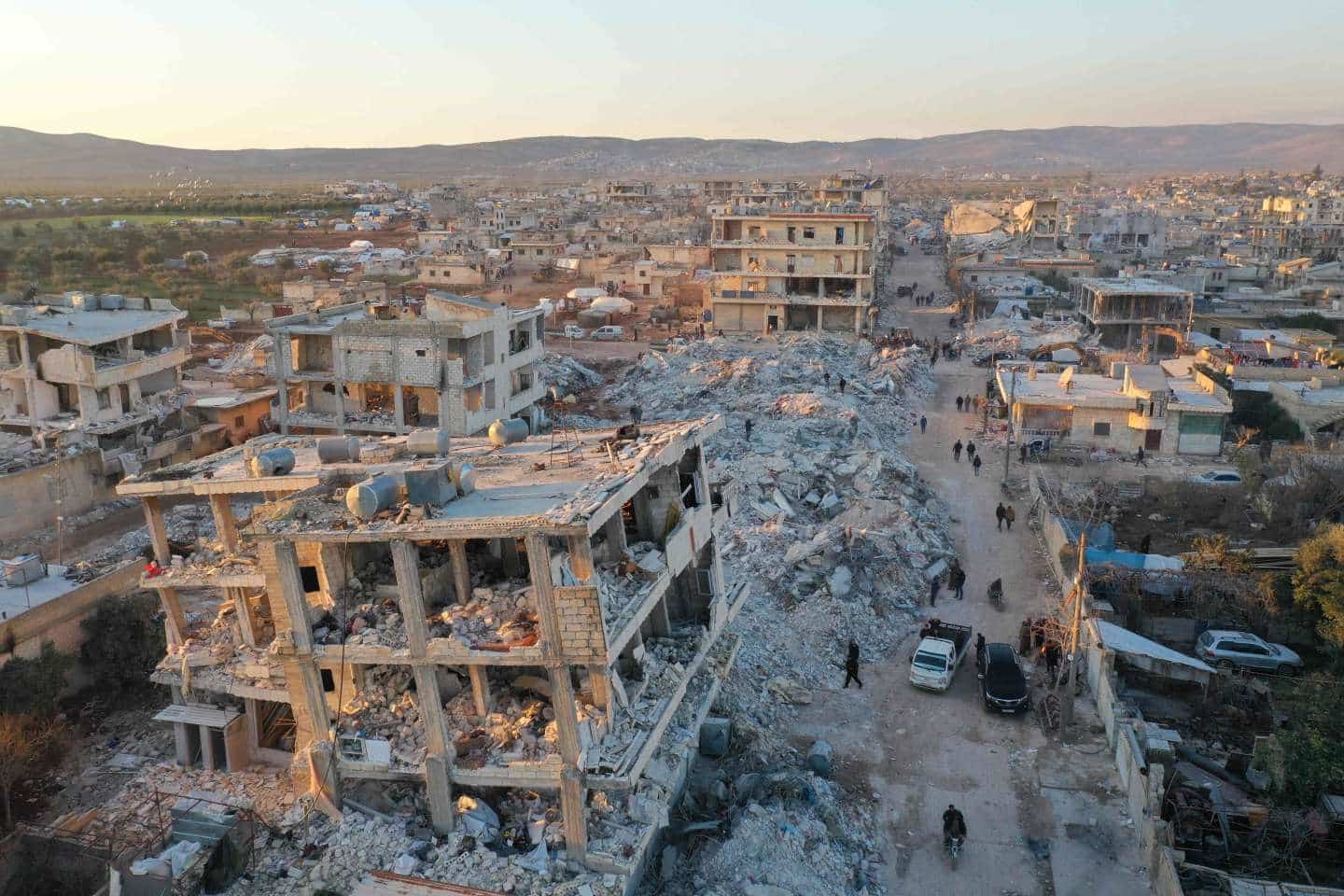 An aerial view shows the destroyed buildings in the rebel-held town of Jindayris on February 9, 2023, three days after a deadly earthquake that hit Turkey and Syria. Photo: Omar HAJ KADOUR /AFP.