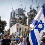 Palestinians have been excluded from recent Israeli demonstrations. Photo: Ilia Yefimovich/DPA images.