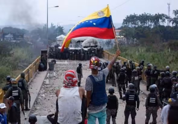 Iconic photo of the Battle of the Bridges on the Simón Bolívar International Bridge on the border of Venezuela and Colombia, February 23, 2019. File photo.