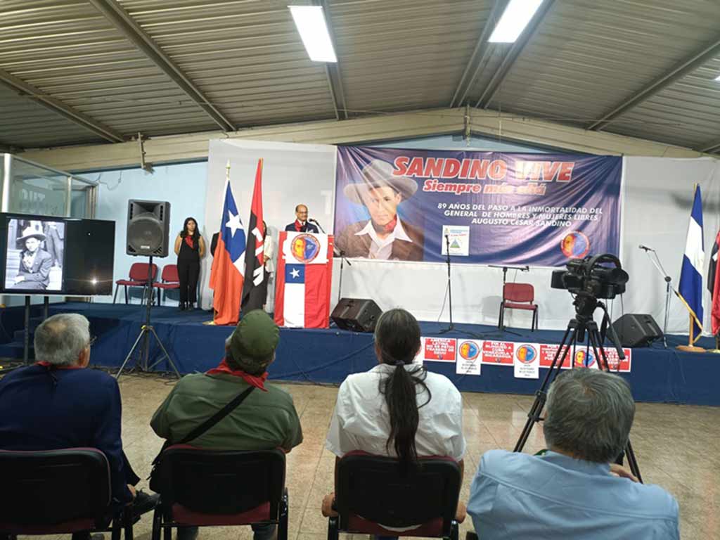 Featured image: Activists speak at an event held by Chilean trade unions and social movements in honor of Nicaraguan revolutionary hero Augusto César Sandino, Santiago, Chile, February 21, 2023. Photo: Prensa Latina.